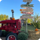 corn maze signs with tractor